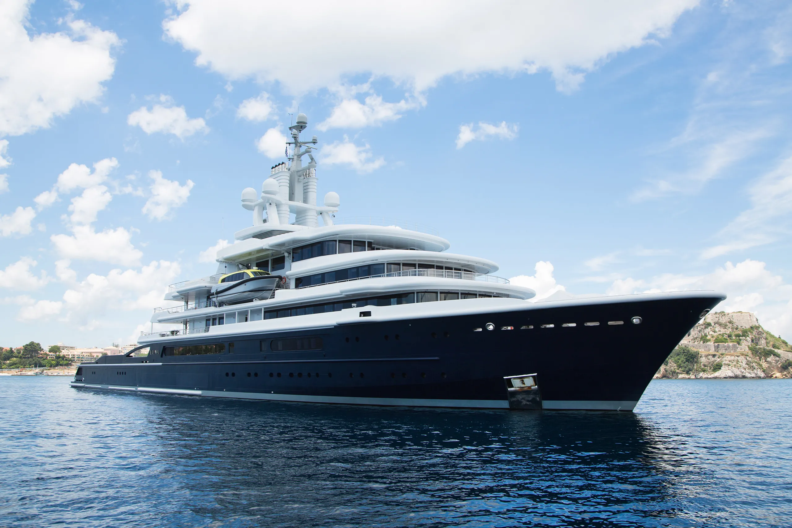 A charter superyacht in a luxury destination