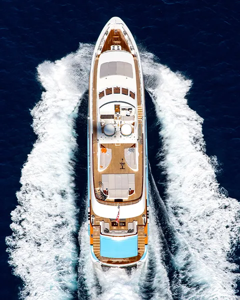 Overhead view of a superyacht underway