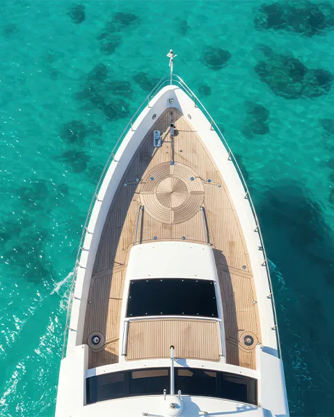 drone view of the bow of a charter superyacht